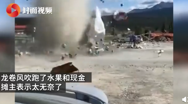 加拿大龍卷風(fēng)精準(zhǔn)襲擊水果攤，卷走水果和現(xiàn)金后消散，攤主很無(wú)奈(圖2)